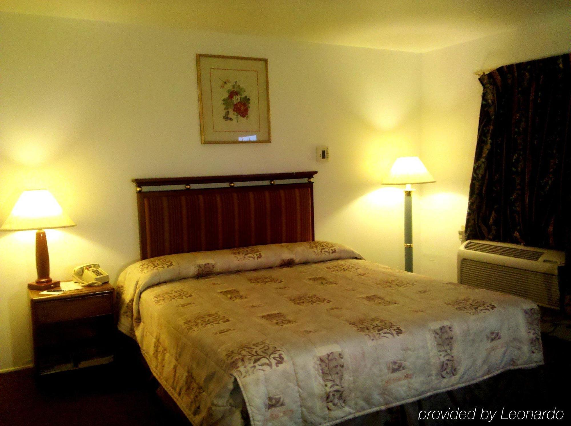 Maple Inn And Suites لوس بانوس الغرفة الصورة